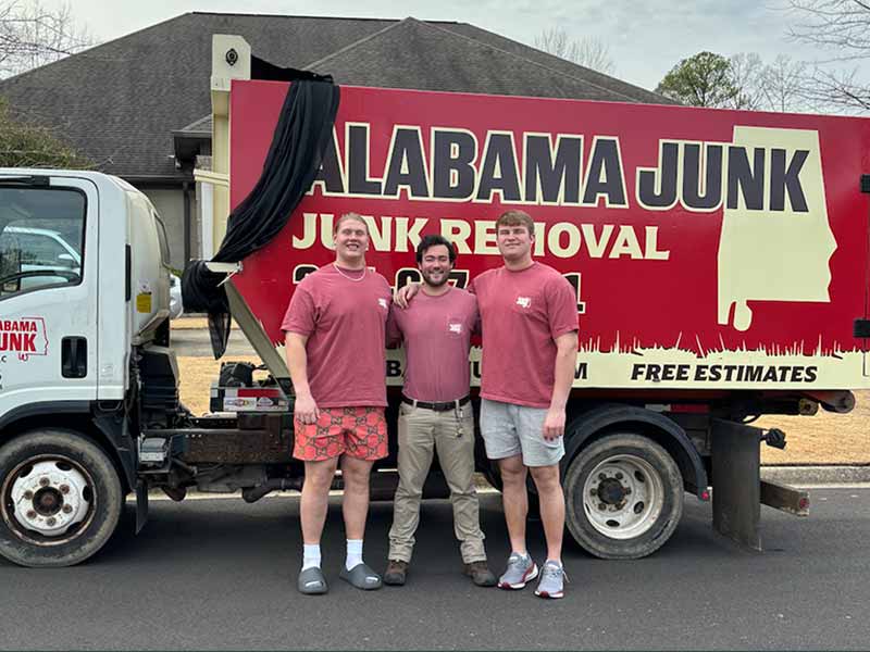 Alabama Junk Truck Experts Posing